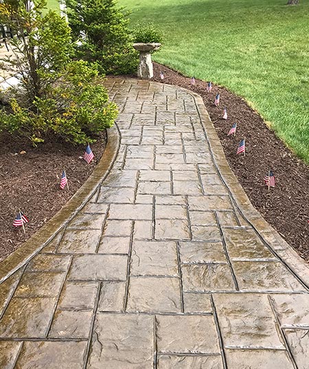 Stamped Concrete Walkway by Alernative Paving